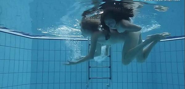  Two hot lesbians in the pool loving eachother